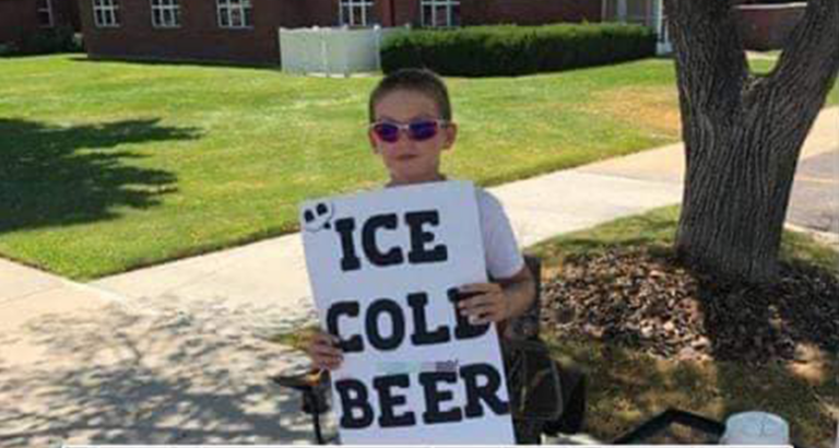 Police are called on boy selling ‘Ice Cold Beer’ but his clever sign has them laughing