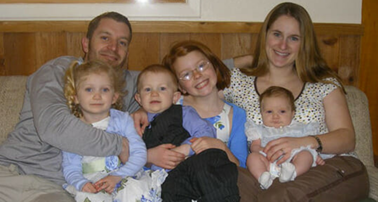Creepy! This looks like a normal family photo until you see what’s hiding underneath mom