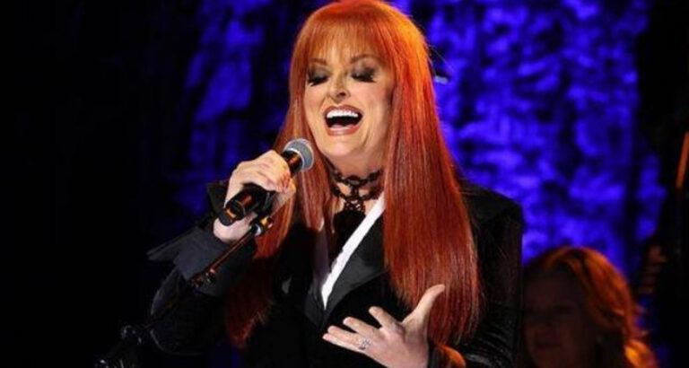Fans Notice Wynonna Judd, 60, ‘Lost Too Much Weight’ as She Flaunts ‘Skinny’ Look in Black Plunging Outfit