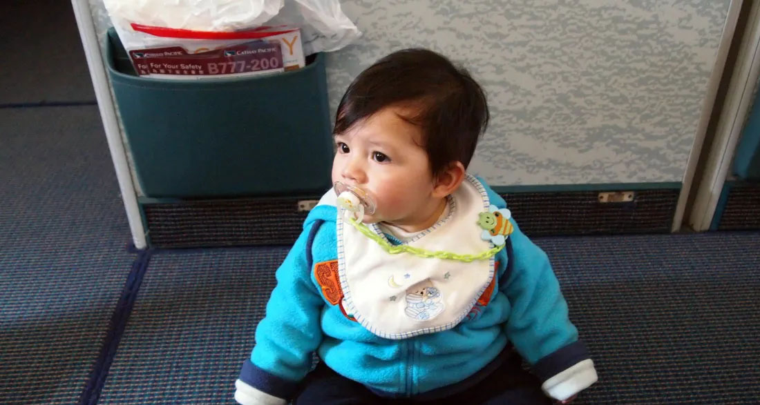 Stewardess Checks Business Class Cabin, Finds a Baby Abandoned in a Seat with a Note